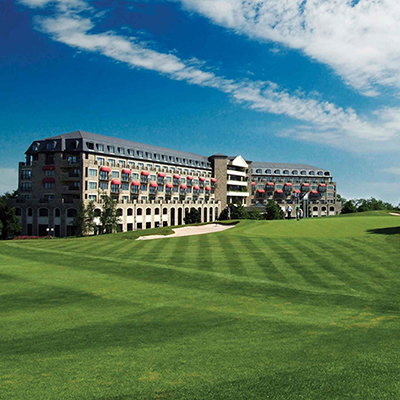The exterior of the Celtic Manor Resort hotel set within the golf course